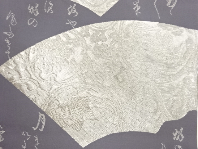  破れ色紙に唐草・山模様織出し袋帯